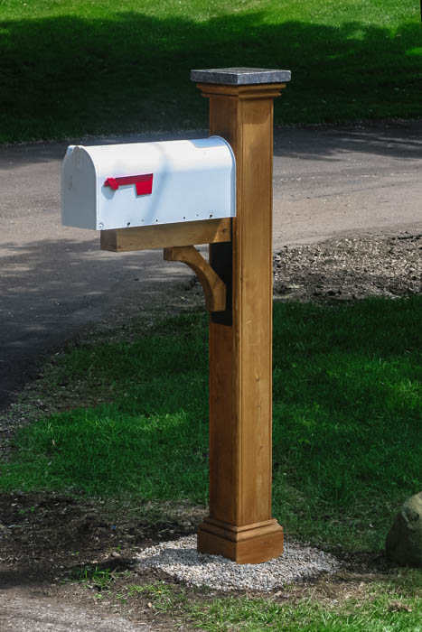 cedar mailbox post with granite post cap, white mailbox, steel bracket